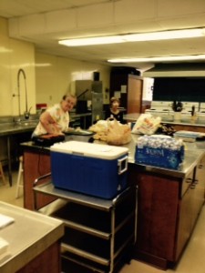 Kitchen workers preparing the meal for the donors.
